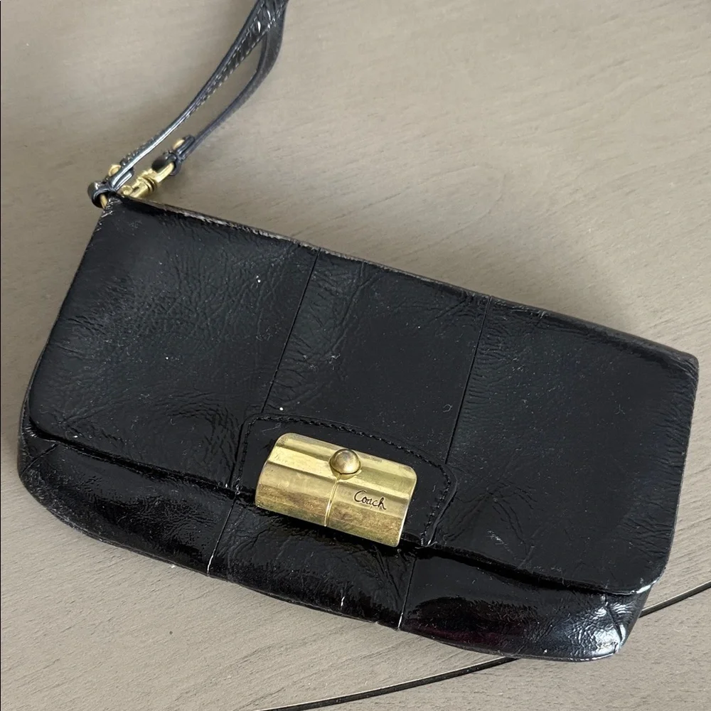 Coach Black Wristlet with Gold Accent - Picture 1 of 5